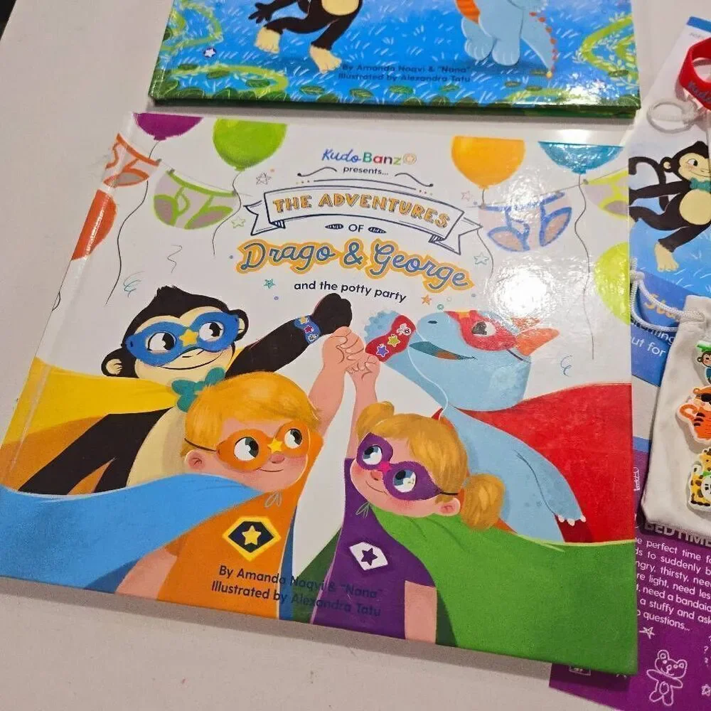 Kudo Banz Drago and George and The Potty Party book with Safari bag. Like new po